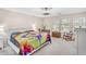 Spacious bedroom with natural light, a comfortable bed, rocking chair and a tranquil, relaxing atmosphere at 1578 S Sabino Ct, Gilbert, AZ 85296