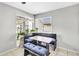 Cozy breakfast nook with bench seating and a bright window, perfect for Gathering meals and gatherings at 1578 S Sabino Ct, Gilbert, AZ 85296