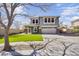 Charming two-story home with well-manicured lawn and inviting curb appeal, featuring a two car garage and a covered entryway at 1578 S Sabino Ct, Gilbert, AZ 85296