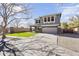 Attractive two-story home with a well-manicured lawn, grey paint, and a spacious two-car garage at 1578 S Sabino Ct, Gilbert, AZ 85296