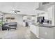 Eat-in kitchen area with a cozy breakfast nook, white cabinets, and granite countertops for meal preparation at 1578 S Sabino Ct, Gilbert, AZ 85296