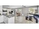 Spacious kitchen with a central island, seating, a dining nook, and modern appliances for versatile use at 1578 S Sabino Ct, Gilbert, AZ 85296