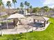 Community playground with colorful play structures, a shaded picnic area, and grassy spaces for fun and recreation at 1578 S Sabino Ct, Gilbert, AZ 85296