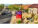 Community retail and dining area featuring prominent signage, decorative landscaping, and convenient parking at 17763 N 93Rd Way, Scottsdale, AZ 85255
