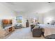 Main bedroom with a king-size bed and plenty of natural light at 17763 N 93Rd Way, Scottsdale, AZ 85255