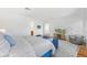 Main bedroom with hardwood floors, neutral walls, sitting area and a large bed at 17763 N 93Rd Way, Scottsdale, AZ 85255