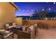 Relaxing patio with fire pit and seating area, perfect for outdoor entertaining at 17763 N 93Rd Way, Scottsdale, AZ 85255