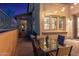 Outdoor patio area with a dining table and seating area at 17763 N 93Rd Way, Scottsdale, AZ 85255