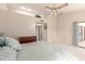 Primary bedroom with access to the patio and walk-in closet at 19511 N 143Rd Dr, Sun City West, AZ 85375