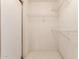 Spacious closet with wire shelving and hanging rods at 19511 N 143Rd Dr, Sun City West, AZ 85375