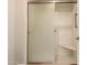 Shower stall with built-in seat and glass enclosure at 19511 N 143Rd Dr, Sun City West, AZ 85375