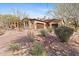 Elegant home with a landscaped yard and brick driveway at 2499 S Pinyon Village Dr # 25, Gold Canyon, AZ 85118