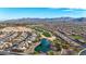 Aerial view of community with golf course and lake at 26686 W Piute Ave, Buckeye, AZ 85396