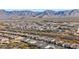 Aerial view of community with mountain backdrop at 26686 W Piute Ave, Buckeye, AZ 85396