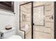 Spa-like bathroom with a walk-in shower and built-in seating at 26686 W Piute Ave, Buckeye, AZ 85396