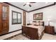 Charming guest bedroom with a queen-size bed and ornate accents at 26686 W Piute Ave, Buckeye, AZ 85396