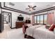 Luxurious main bedroom, featuring a king-size bed and ensuite bathroom at 26686 W Piute Ave, Buckeye, AZ 85396