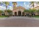 Spanish-style clubhouse with brick pavers at 26686 W Piute Ave, Buckeye, AZ 85396