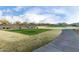 Golf course with a winding path and mountain views at 26686 W Piute Ave, Buckeye, AZ 85396