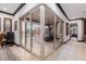 Glass doors open to a patio, view from interior hallway at 26686 W Piute Ave, Buckeye, AZ 85396