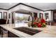 Kitchen island with large sink and views to backyard at 26686 W Piute Ave, Buckeye, AZ 85396