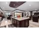 Large kitchen island with granite countertop and sink at 26686 W Piute Ave, Buckeye, AZ 85396
