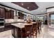 Open floor plan kitchen with island and breakfast bar at 26686 W Piute Ave, Buckeye, AZ 85396