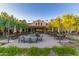 Outdoor patio area with seating and fire pit at 26686 W Piute Ave, Buckeye, AZ 85396
