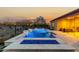 Entertain in the expansive backyard with pool and fire pit at 26686 W Piute Ave, Buckeye, AZ 85396