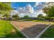 Outdoor sand volleyball court with surrounding landscaping at 26686 W Piute Ave, Buckeye, AZ 85396