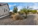 Landscaped side yard with gravel and desert plants at 26686 W Piute Ave, Buckeye, AZ 85396