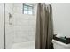 Clean bathroom featuring a tiled shower and tub combo with neutral decor at 2809 N 82Nd Pl, Mesa, AZ 85207