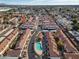 Aerial view of community with pool and surrounding buildings at 2955 N Oregon St # 9, Chandler, AZ 85225