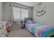 Charming bedroom featuring a twin bed and plenty of storage at 2955 N Oregon St # 9, Chandler, AZ 85225