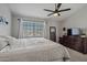 King-size bed in bright bedroom with ceiling fan at 2955 N Oregon St # 9, Chandler, AZ 85225