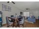 Open concept dining area with seating for four, adjacent to living room at 2955 N Oregon St # 9, Chandler, AZ 85225