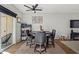 Dining area features a table with four chairs and views to the living room at 2955 N Oregon St # 9, Chandler, AZ 85225