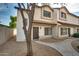 Two-story stucco home with a walkway and landscaping at 2955 N Oregon St # 9, Chandler, AZ 85225