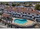 Community pool and spa with covered patio area at 2955 N Oregon St # 9, Chandler, AZ 85225