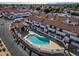 Community pool and spa with covered patio area at 2955 N Oregon St # 9, Chandler, AZ 85225