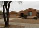 One-story house with a two-car garage and desert landscaping at 3337 W Galvin St, Phoenix, AZ 85086