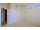 Spacious bedroom with a closet and windows with shutters allowing ample natural light at 33809 N 67Th St, Scottsdale, AZ 85266