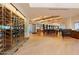 Elegant dining room with wine storage and a modern design at 33809 N 67Th St, Scottsdale, AZ 85266