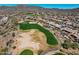 Scenic aerial of community golf course, homes, and the natural desert landscape at 41515 N Laurel Valley Way, Anthem, AZ 85086
