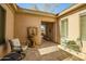 Cozy courtyard featuring a decorative fountain, comfortable seating, and tranquil outdoor ambiance at 41515 N Laurel Valley Way, Anthem, AZ 85086