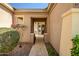 Inviting front entrance with a walkway, desert landscaping, and decorative plants at 41515 N Laurel Valley Way, Anthem, AZ 85086