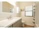 Charming bathroom with neutral paint, ample lighting, and shower/tub combo at 4415 E Weaver Rd, Phoenix, AZ 85050