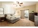 Stylish bedroom with modern decor, geometric accent wall and a sliding barn door at 4415 E Weaver Rd, Phoenix, AZ 85050