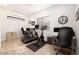 Bright home office features modern workout equipment and dual workstation desks at 4415 E Weaver Rd, Phoenix, AZ 85050