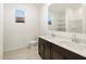 Bathroom with double vanity, mirror and toilet at 5065 W Hunter Trl, San Tan Valley, AZ 85144